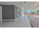 Cozy outdoor covered patio with white tiles at 5803 Cresthill Dr, Tampa, FL 33615