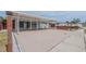 Well-maintained single-story home with a spacious carport and manicured lawn at 5803 Cresthill Dr, Tampa, FL 33615