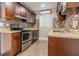 Updated kitchen featuring stainless steel appliances and attractive countertops at 5803 Cresthill Dr, Tampa, FL 33615