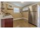 Functional utility room with a sink and ample counter space at 5803 Cresthill Dr, Tampa, FL 33615
