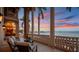 Inviting waterfront balcony with comfortable seating and stunning water views at 5810 Mariner St, Tampa, FL 33609