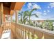 Inviting outdoor balcony with lush landscaping and views of nearby waterway at 5810 Mariner St, Tampa, FL 33609