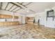 Large garage with custom tile flooring and plenty of cabinet space at 5810 Mariner St, Tampa, FL 33609