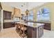 Gourmet kitchen with center island, custom cabinets, and water views at 5810 Mariner St, Tampa, FL 33609