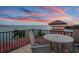 Rooftop deck with seating overlooking expansive water views at dusk at 5810 Mariner St, Tampa, FL 33609