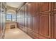 Expansive walk-in closet with custom built-ins and ample storage space at 5810 Mariner St, Tampa, FL 33609