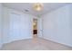 Clean bedroom view features natural light, a closet, and an attached bathroom at 5933 Caldera Ridge Dr, Lithia, FL 33547
