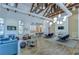 Inviting clubhouse interior with a mix of lounge seating, dining spaces, and a bar area for community gatherings at 5933 Caldera Ridge Dr, Lithia, FL 33547