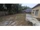 Large backyard featuring an unfinished lawn and privacy fence at 6213 Crickethollow Dr, Riverview, FL 33578