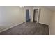Bedroom with neutral walls, carpet flooring, closet and ceiling fan at 6213 Crickethollow Dr, Riverview, FL 33578