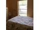 Cozy bedroom with window and plenty of natural light at 6488 Robinswood Ave, Brooksville, FL 34602