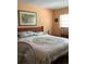 Cozy bedroom with comfortable bed and natural light at 6488 Robinswood Ave, Brooksville, FL 34602