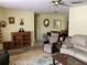 Comfortable living room with neutral-toned furniture and decor, perfect for relaxation at 6488 Robinswood Ave, Brooksville, FL 34602