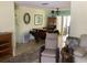 Inviting living room featuring unique wooden furniture and comfortable seating arrangement at 6488 Robinswood Ave, Brooksville, FL 34602