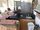 Covered patio featuring an outdoor bar with sink and counter space at 6488 Robinswood Ave, Brooksville, FL 34602