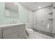 Remodeled bathroom with glass shower and modern fixtures at 6607 Larimer Dr, Tampa, FL 33615