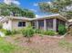 A screened lanai extends from this home, creating a harmonious blend of indoor and outdoor living spaces at 7216 N Mobley Rd, Odessa, FL 33556