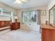 Bright bedroom featuring natural light and furnishings at 7216 N Mobley Rd, Odessa, FL 33556