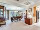 Dining room area featuring a chandelier and view of the entryway at 7216 N Mobley Rd, Odessa, FL 33556