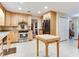 Spacious kitchen with stainless steel appliances and tile flooring at 7216 N Mobley Rd, Odessa, FL 33556