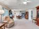 Open-concept living space including dining area and a comfortable seating area at 7216 N Mobley Rd, Odessa, FL 33556