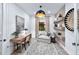Comfortable office with a desk, chair, a lounge chair, and decorative shelving, perfect for working from home at 7614 Addison Ave, Bradenton, FL 34210