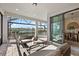 Inviting covered patio featuring comfortable seating, a dining area, and a serene view of the pool at 7614 Addison Ave, Bradenton, FL 34210
