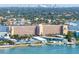 Stunning aerial view of the waterfront property, highlighting the building's architectural design and location at 7922 Sailboat Key S Blvd # 608, South Pasadena, FL 33707