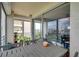 Balcony featuring a dining table with views of the surrounding neighborhood and waterways at 7922 Sailboat Key S Blvd # 608, South Pasadena, FL 33707