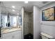 Bathroom featuring a large vanity and glass-enclosed shower at 7922 Sailboat Key S Blvd # 608, South Pasadena, FL 33707