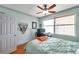 Bedroom includes ceiling fan, built-in shelving, and modern furniture at 7922 Sailboat Key S Blvd # 608, South Pasadena, FL 33707