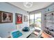 Bright dining area featuring a white table, stylish decor, and sliding glass doors leading to a balcony at 7922 Sailboat Key S Blvd # 608, South Pasadena, FL 33707