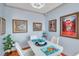 Dining room with modern decor and artwork, filled with light and comfortable seating at 7922 Sailboat Key S Blvd # 608, South Pasadena, FL 33707
