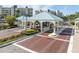 Welcoming entrance gate with well-maintained landscaping and a secure entry point to the property at 7922 Sailboat Key S Blvd # 608, South Pasadena, FL 33707