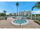 Enjoy the community hot tub with tropical views and lounge chairs at 7922 Sailboat Key S Blvd # 608, South Pasadena, FL 33707