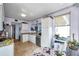 Full kitchen and adjacent dining area, featuring tiled floors and lots of sunlight at 7922 Sailboat Key S Blvd # 608, South Pasadena, FL 33707