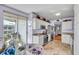Bright eat-in kitchen with stainless steel appliances, white cabinets, access to an outside balcony, and lots of light at 7922 Sailboat Key S Blvd # 608, South Pasadena, FL 33707