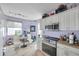 Charming kitchen featuring stainless steel appliances and space for dining at 7922 Sailboat Key S Blvd # 608, South Pasadena, FL 33707