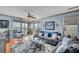 Inviting living room with water views and a sliding glass door that leads to the balcony at 7922 Sailboat Key S Blvd # 608, South Pasadena, FL 33707