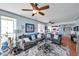 Open-concept living room flows into the kitchen, with comfortable seating and a view of the kitchen bar at 7922 Sailboat Key S Blvd # 608, South Pasadena, FL 33707