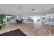 Expansive lounge area with varied seating arrangements and natural light for relaxing and socializing at 7922 Sailboat Key S Blvd # 608, South Pasadena, FL 33707