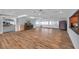 Open lounge area with hardwood flooring and ample space, great for gatherings and events at 7922 Sailboat Key S Blvd # 608, South Pasadena, FL 33707