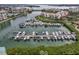Aerial view of a marina with boats docked in the water, offering a serene boating experience at 7922 Sailboat Key S Blvd # 608, South Pasadena, FL 33707