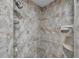 Close up of tile-lined walk in shower at 7922 Sailboat Key S Blvd # 608, South Pasadena, FL 33707