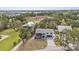 Aerial view of property with lush greenery, showcasing the location of the house at 824 35Th Avenue W Dr, Palmetto, FL 34221