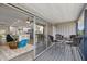 Balcony with seating area offering a view of the kitchen and living room through sliding glass doors at 824 35Th Avenue W Dr, Palmetto, FL 34221