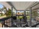 Relaxing balcony with outdoor seating and a view of the surrounding neighborhood at 824 35Th Avenue W Dr, Palmetto, FL 34221