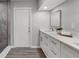 Bright bathroom features a long white vanity, modern fixtures, and a tiled walk-in shower at 824 35Th Avenue W Dr, Palmetto, FL 34221