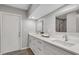 Updated bathroom with dual sinks, new vanity with quartz counters, and modern fixtures at 824 35Th Avenue W Dr, Palmetto, FL 34221