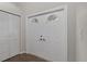 Bright entryway featuring double doors with window inserts, adjacent to a closet for storage at 824 35Th Avenue W Dr, Palmetto, FL 34221